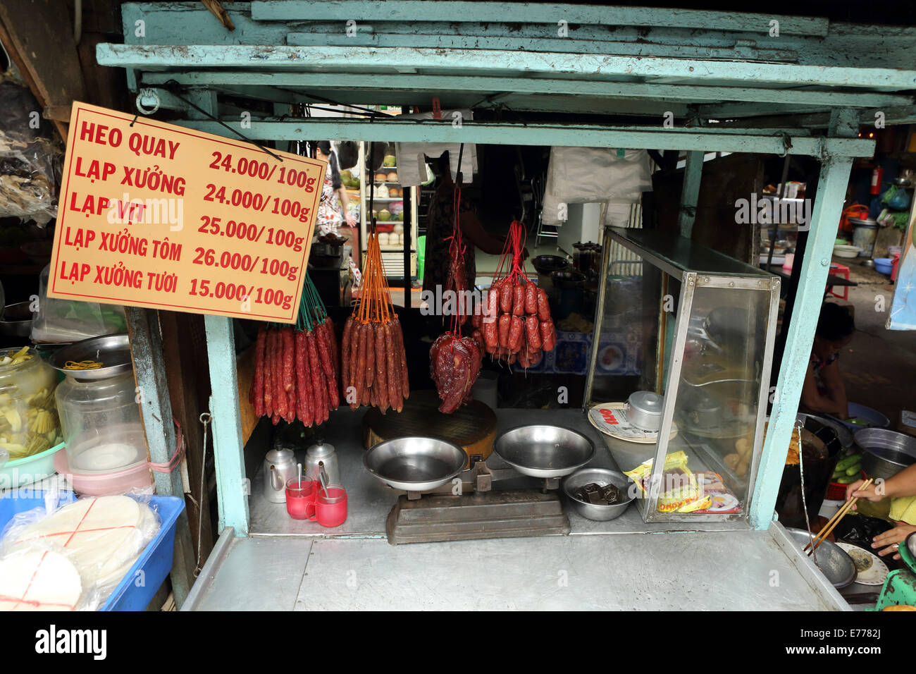 Sausages for sale at a fastfood cart in Ho Chi Minh City, Vietnam. Stock Photo