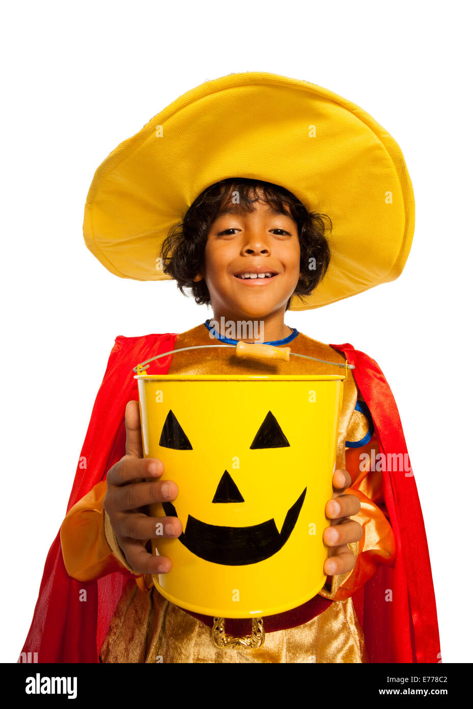 Boy in costume with Halloween spooky candy bucket Stock Photo