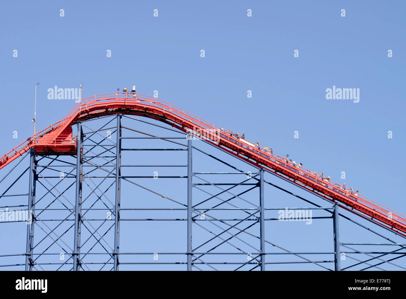 A car approaches the highest point of The Big One roller coaster in Blackpool Pleasure Beach, Blackpool, Lancashire Stock Photo