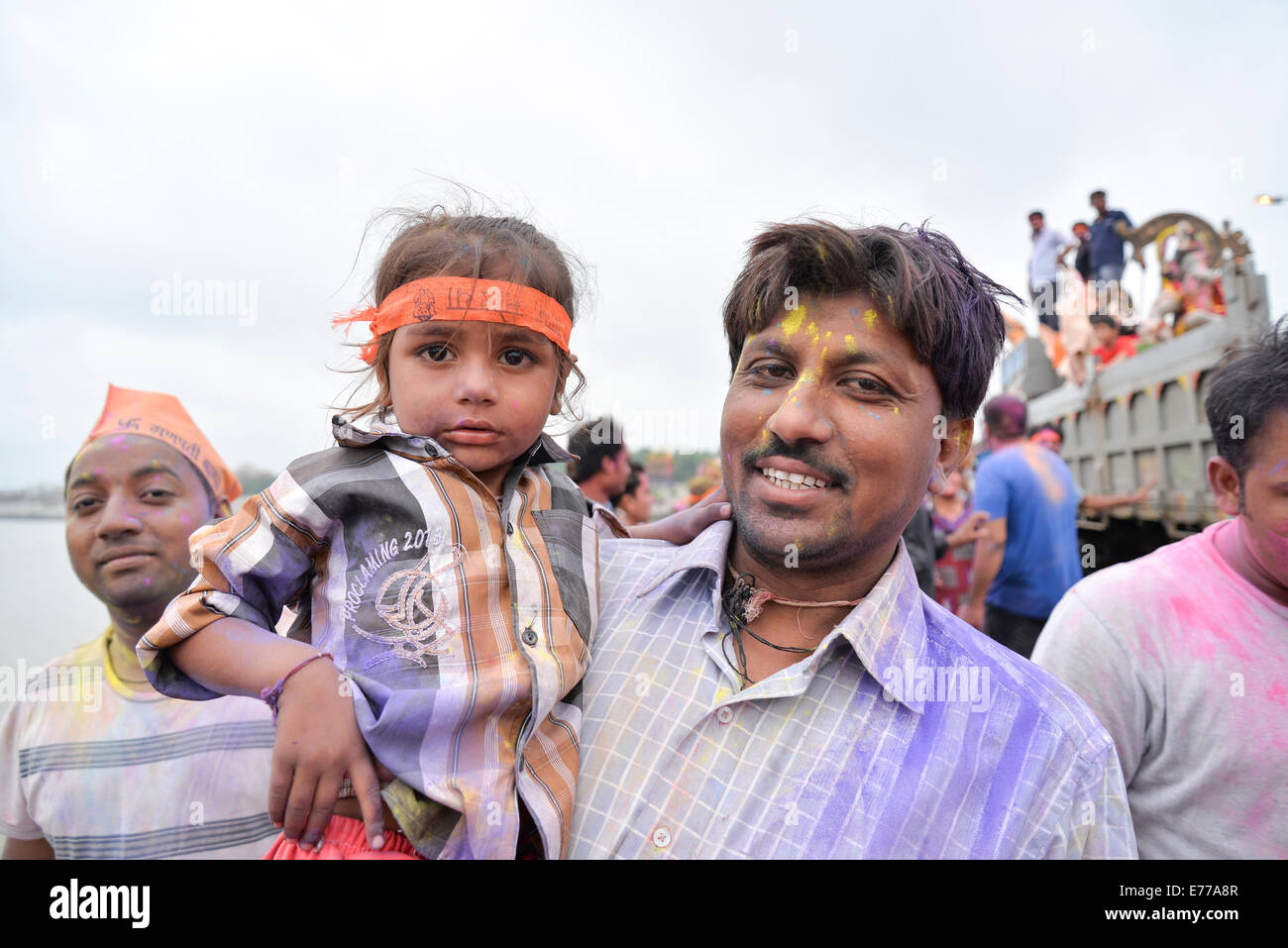 Ahmedabad, Gujarat/India. 8th Sep, 2014. Father and son on Ganesh charuthi  at Sabarmati river for idol immersion during the ten-day-long Ganesh Chaturthi festival, in Ahmedabad,India. Credit:  Nisarg Lakhmani/Alamy Live News Stock Photo