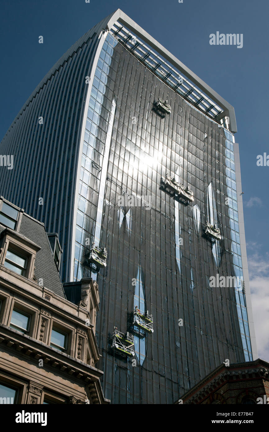 Temporary netting "sunshade" fitted to Walkie Talkie building, City of  London Stock Photo - Alamy