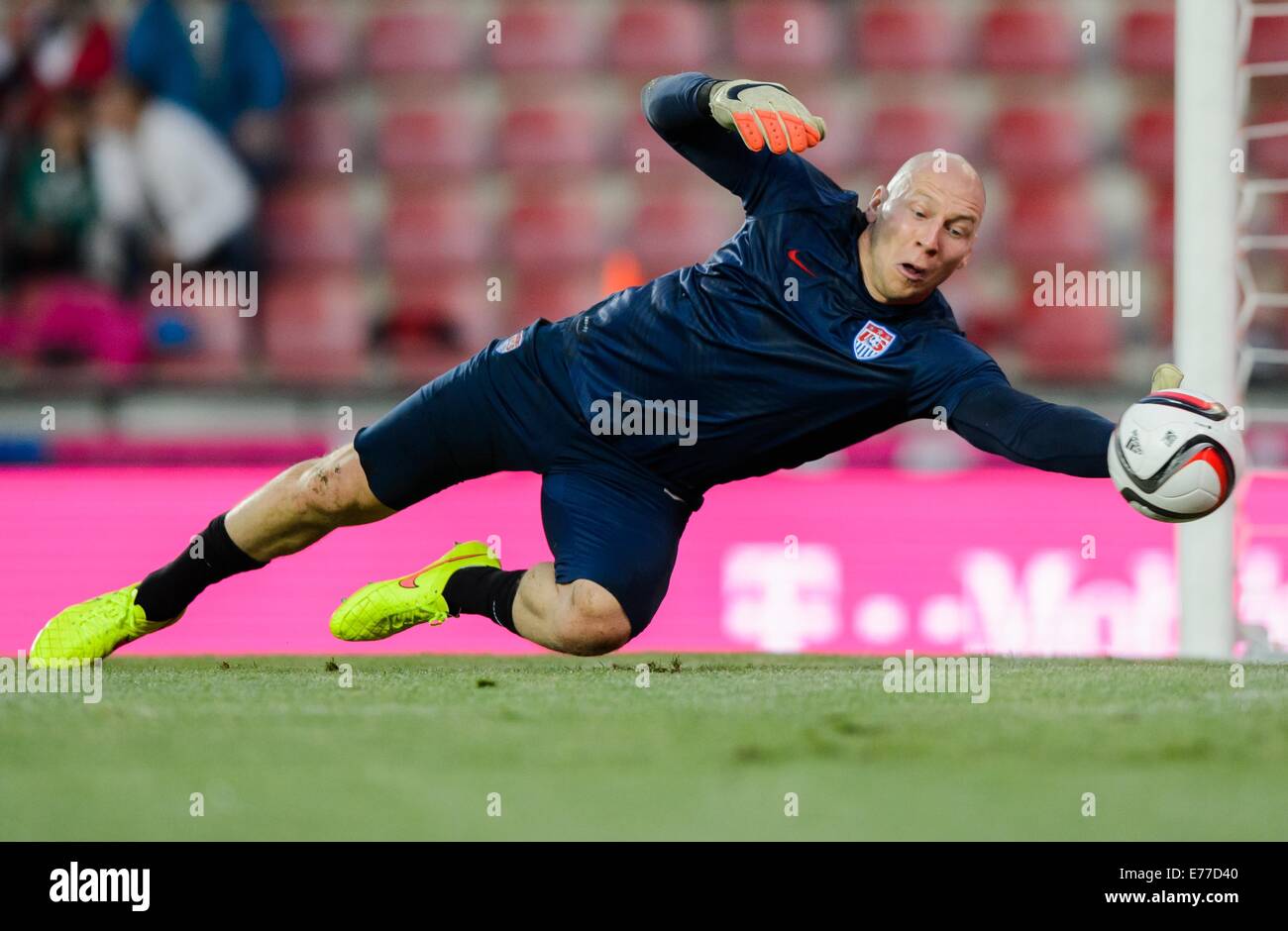 USA's goalkeeper Brad Guzan warms up before the friendly soccer match