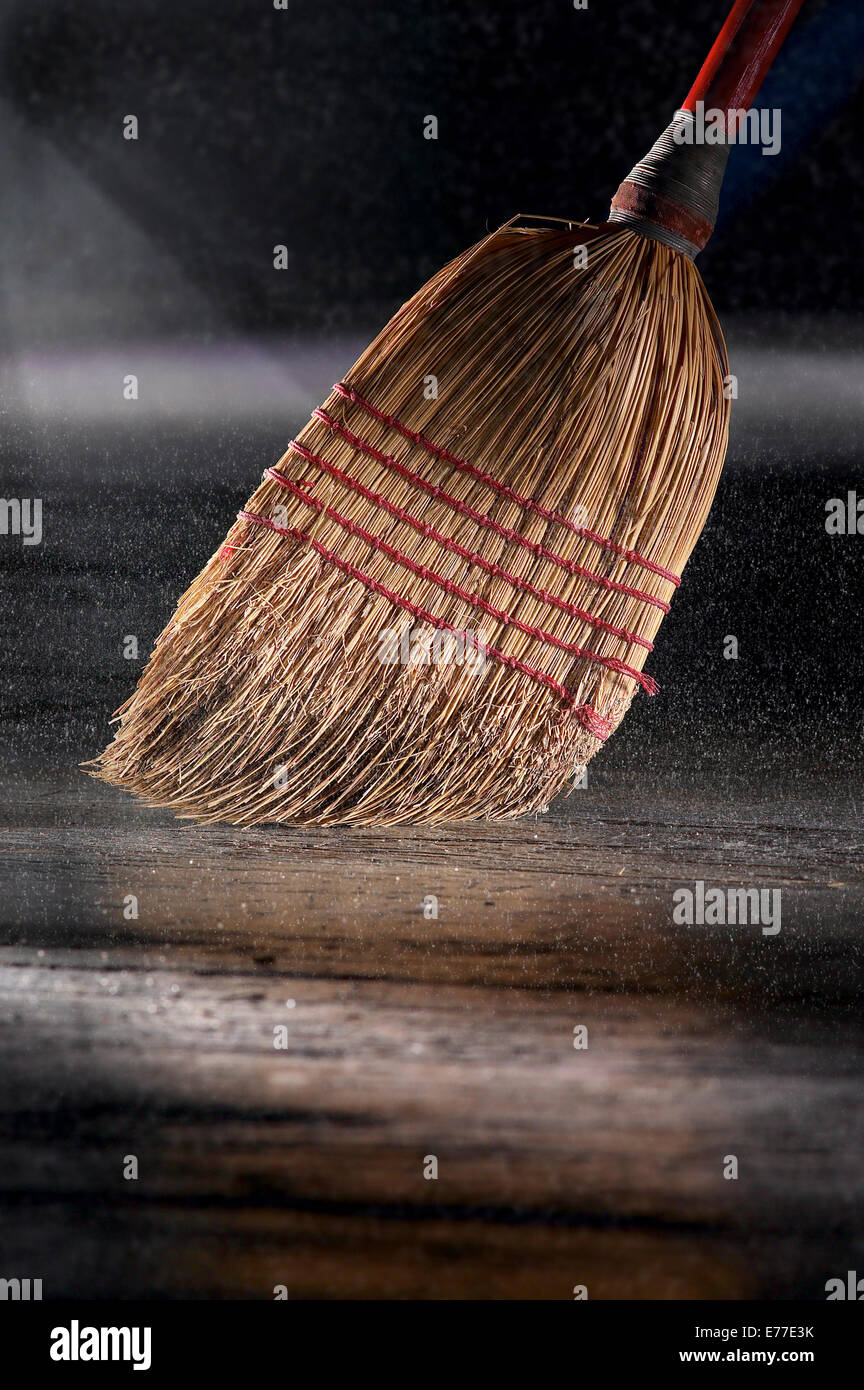 Broom Sweeping Dusty Floor Stock Photo