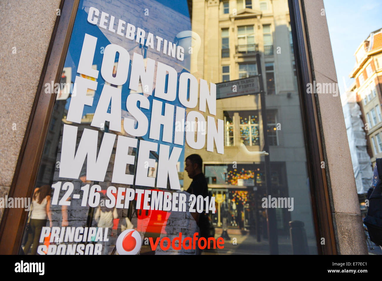 Oxford Street, London, UK. 8th September 2014. Top Shop has adverts for the upcoming London Fashion Week which starts on Friday (12th September). Credit:  Matthew Chattle/Alamy Live News Stock Photo