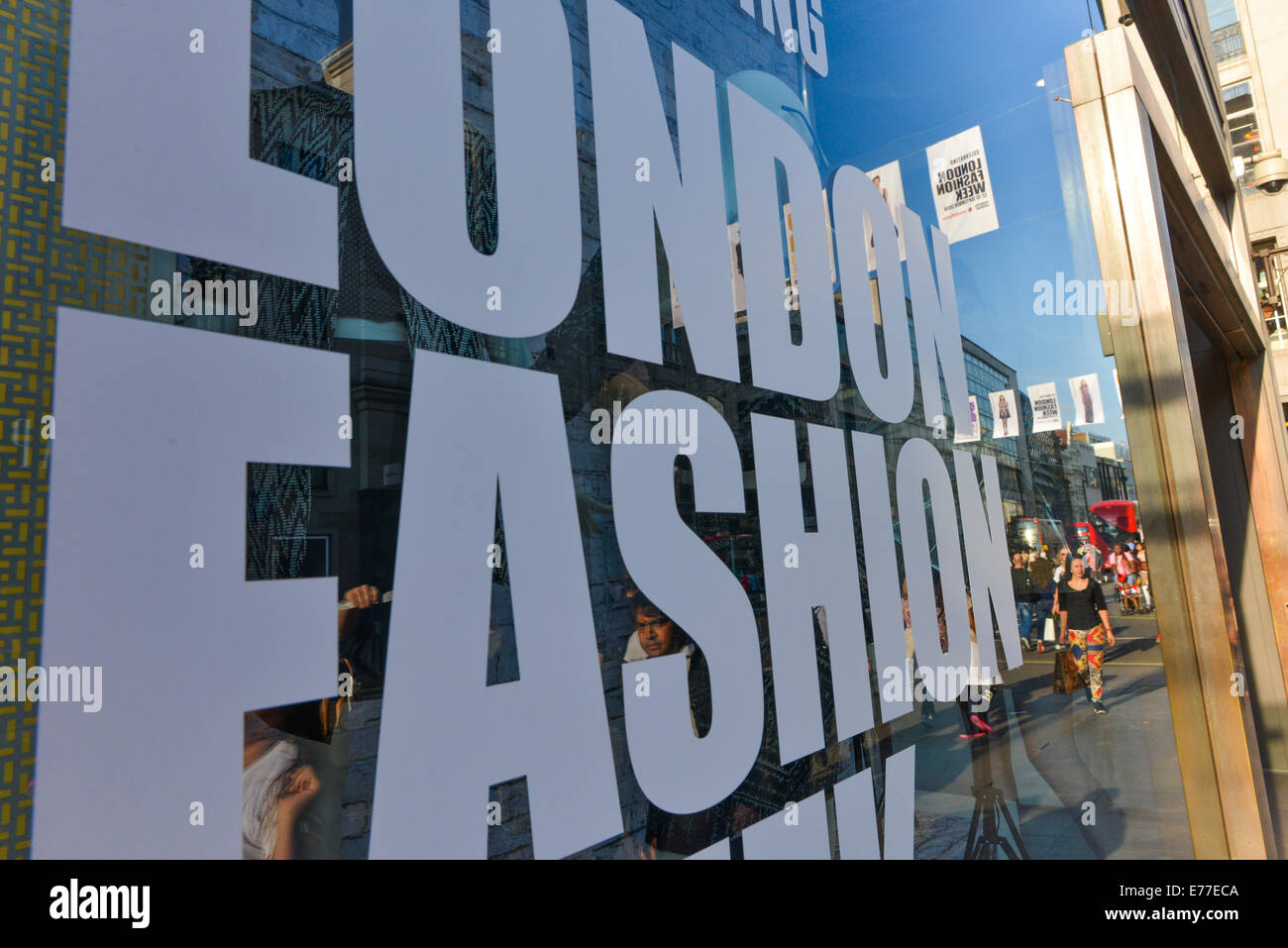 Oxford Street, London, UK. 8th September 2014. Top Shop has adverts for the upcoming London Fashion Week which starts on Friday (12th September). Credit:  Matthew Chattle/Alamy Live News Stock Photo