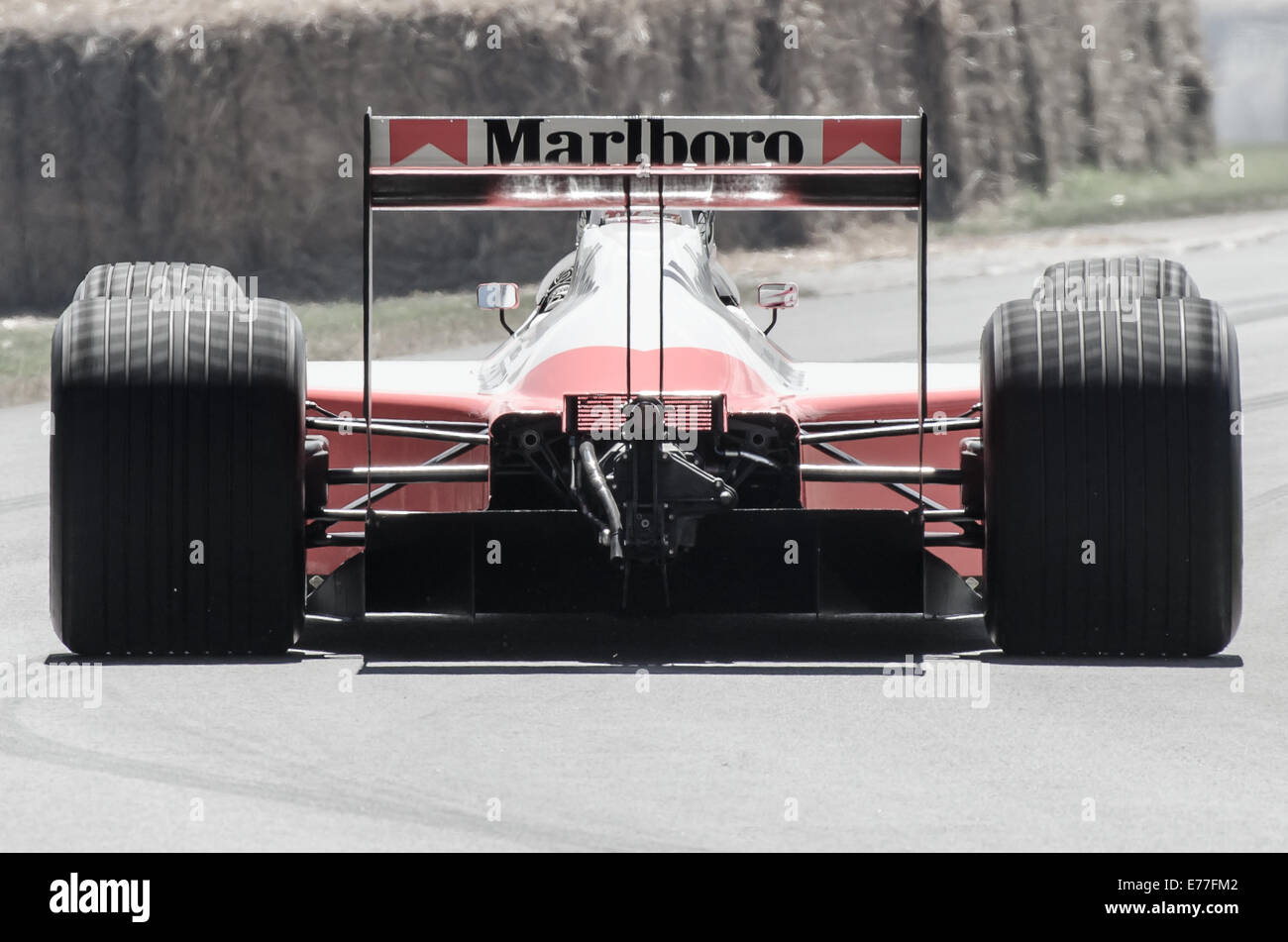 The McLaren MP4/4 was a successful F1 car that competed in the '88 season driven by Ayrton Senna and Alan Prost. Desaturated image. Rear view Stock Photo