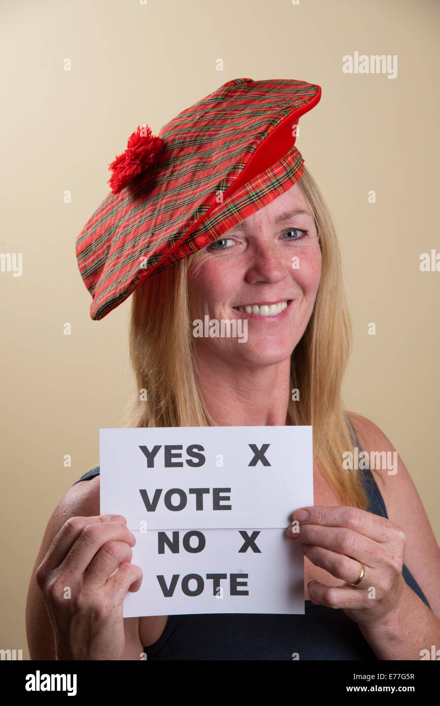 Scottish Referendum undecided  female voter Yes or No. Wearing a Tam o Shanter hat Stock Photo