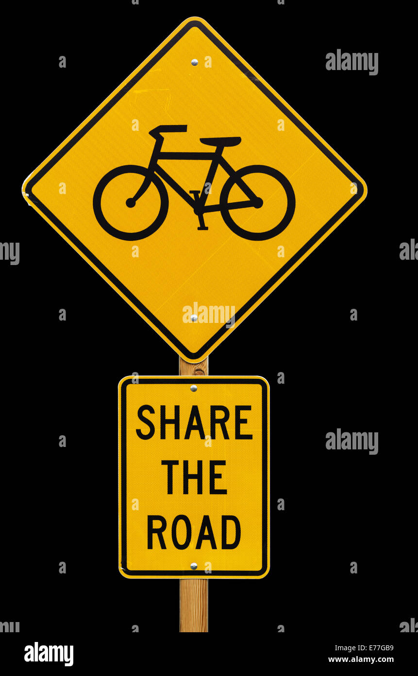 share the road with bicycles road sign isolated on black background Stock Photo