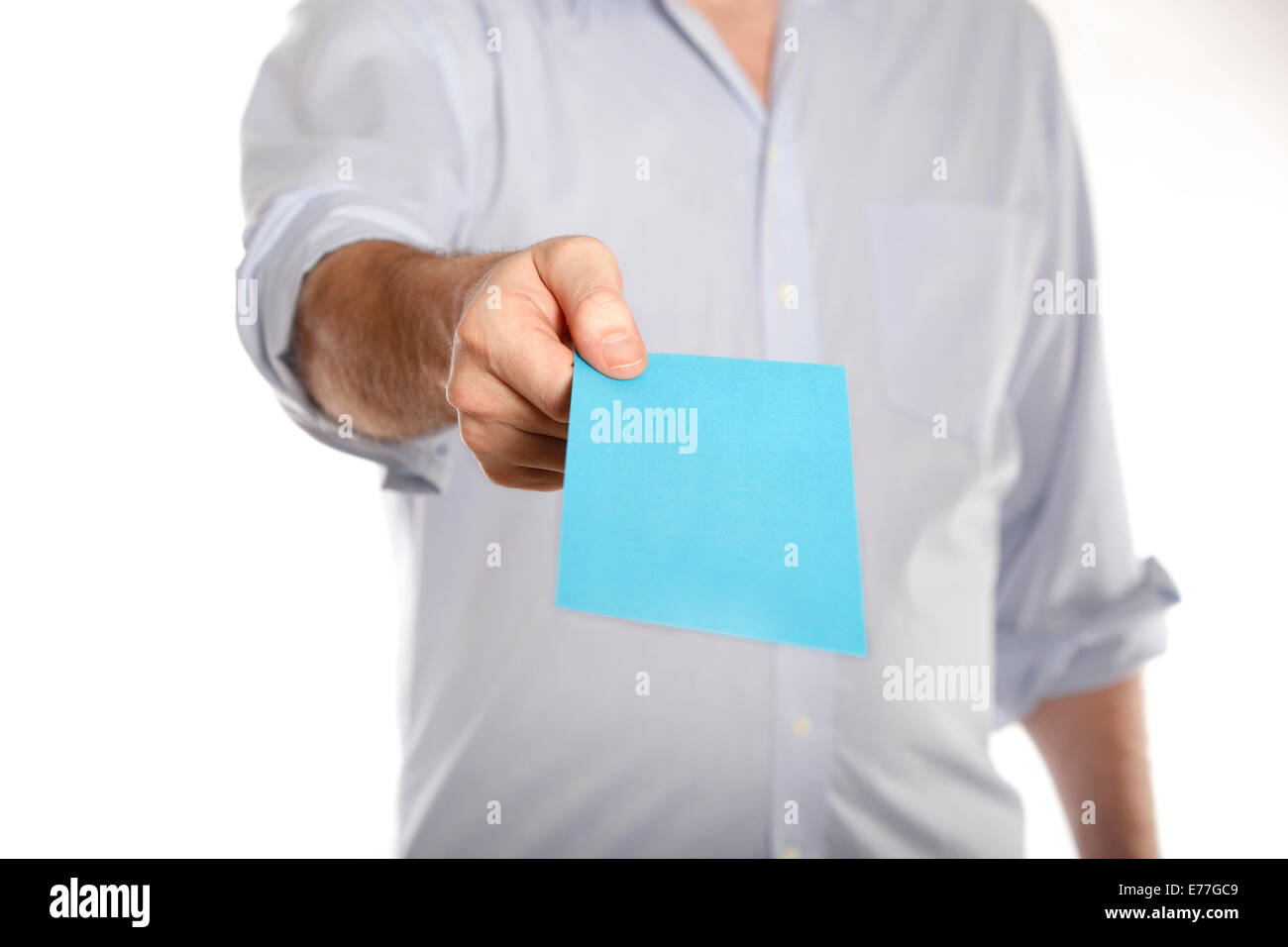 Man holds a blue letter with termination Stock Photo