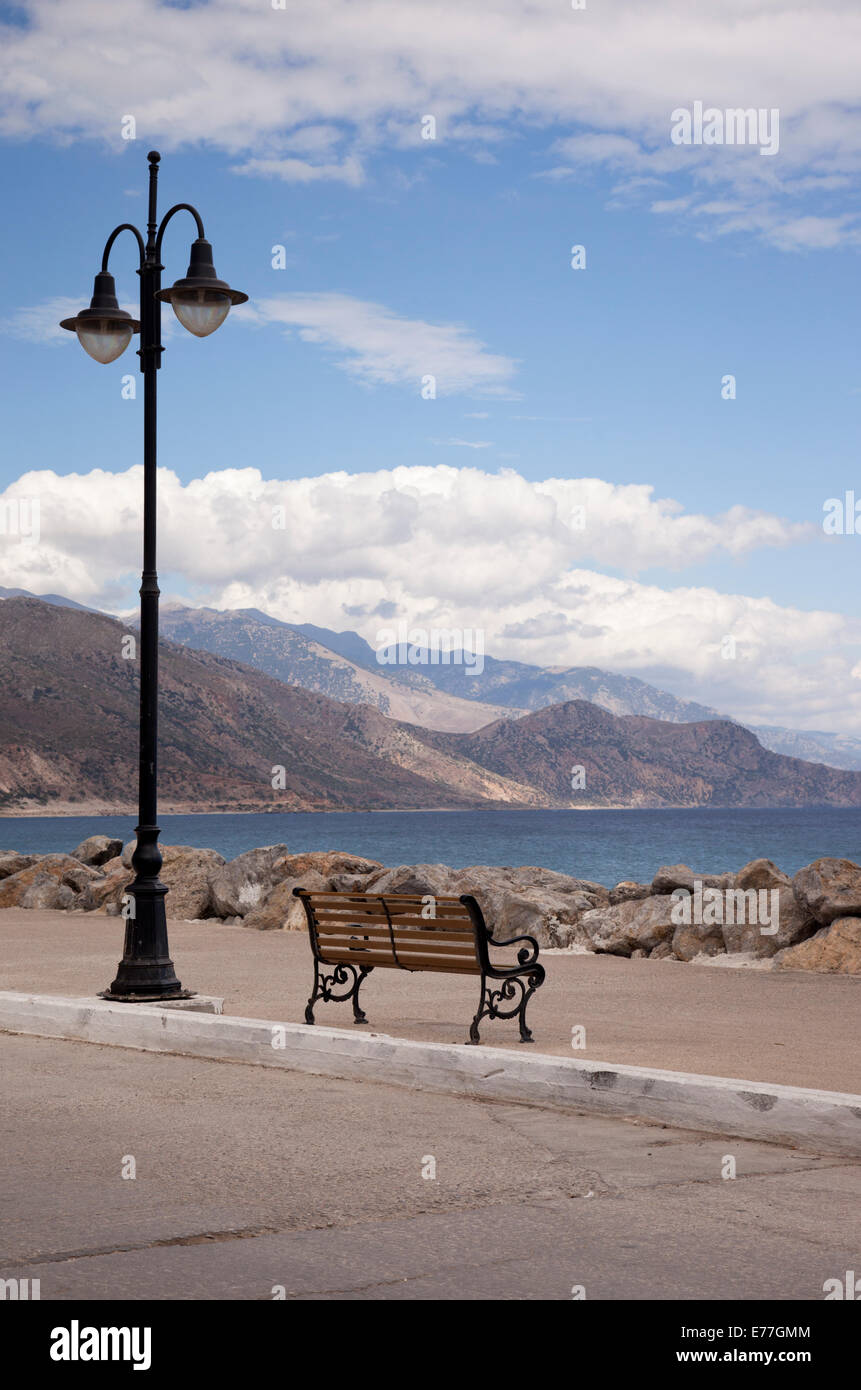 Street lamp and bench in Paleochora, Crete, Greece Stock Photo