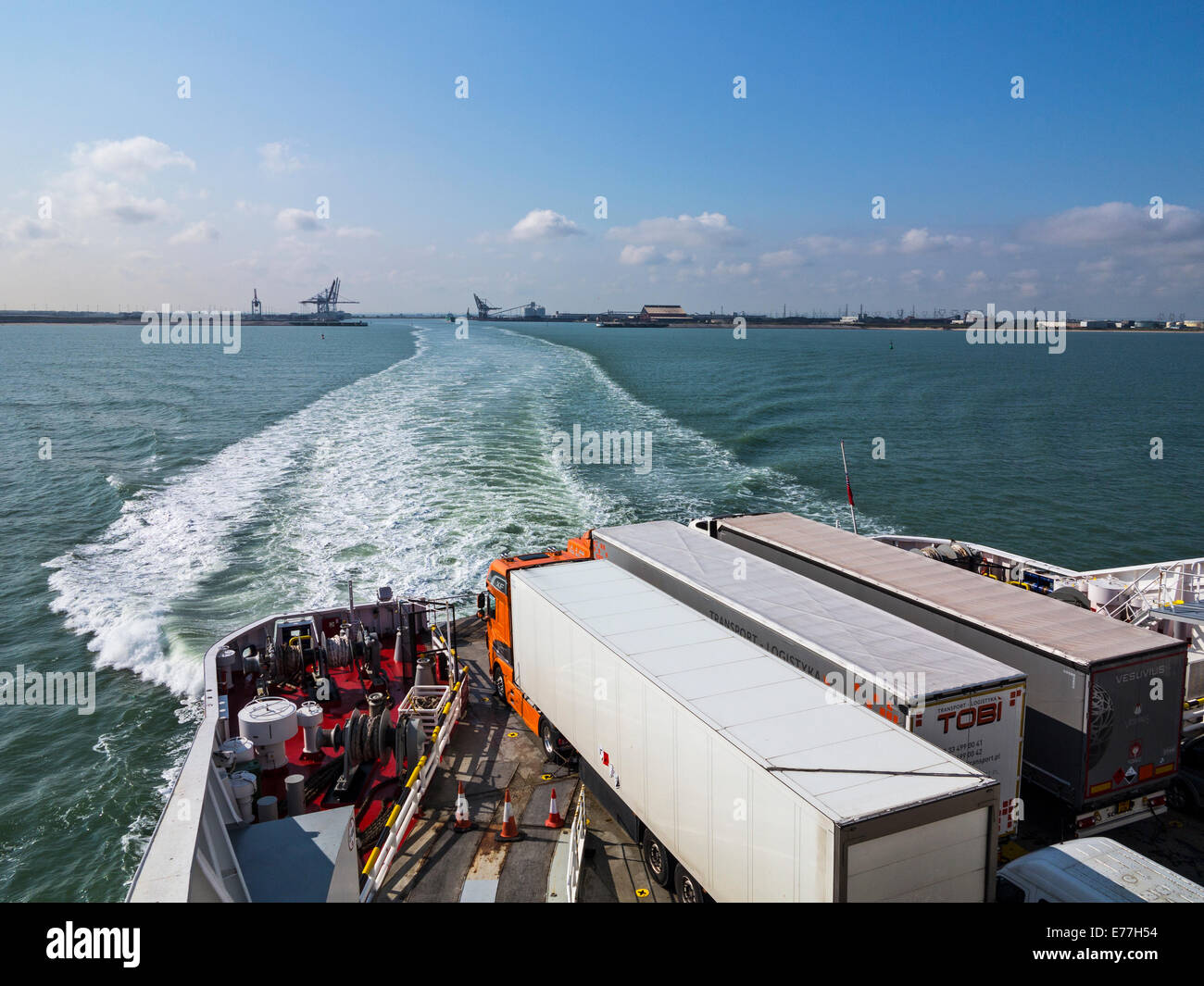 Articulated lorries loaded aboard a ro-ro cross-channel ferry departing from Dunkerque Stock Photo