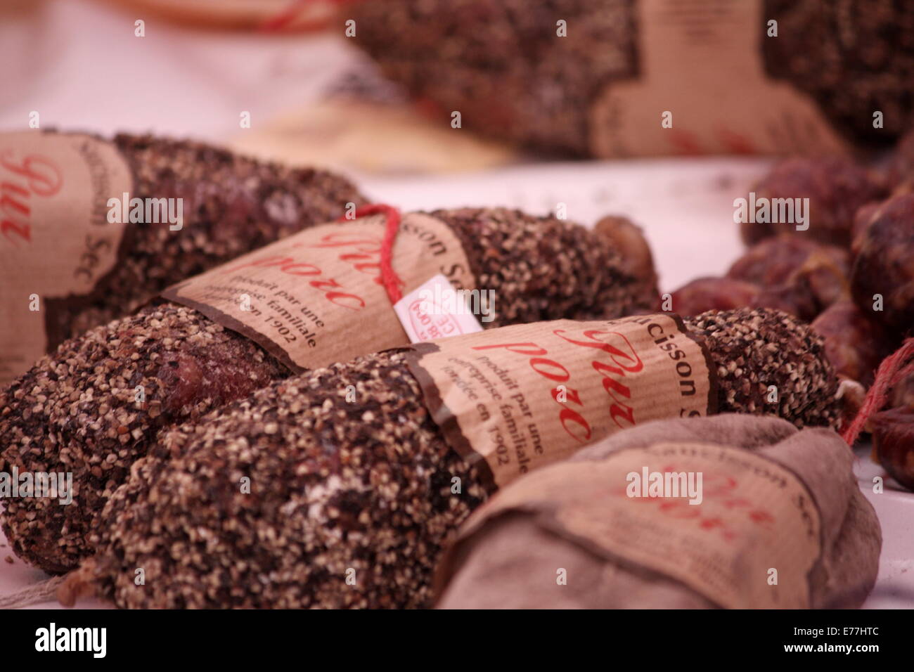 Cured sausages in french market in Sommieres Stock Photo