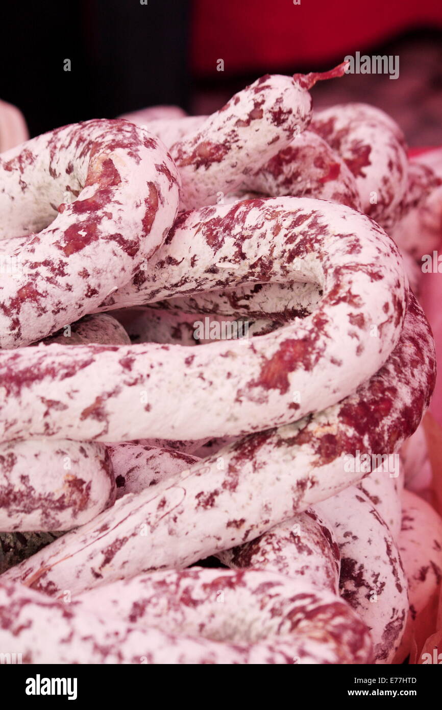 Cured sausages in french market in Sommieres Stock Photo