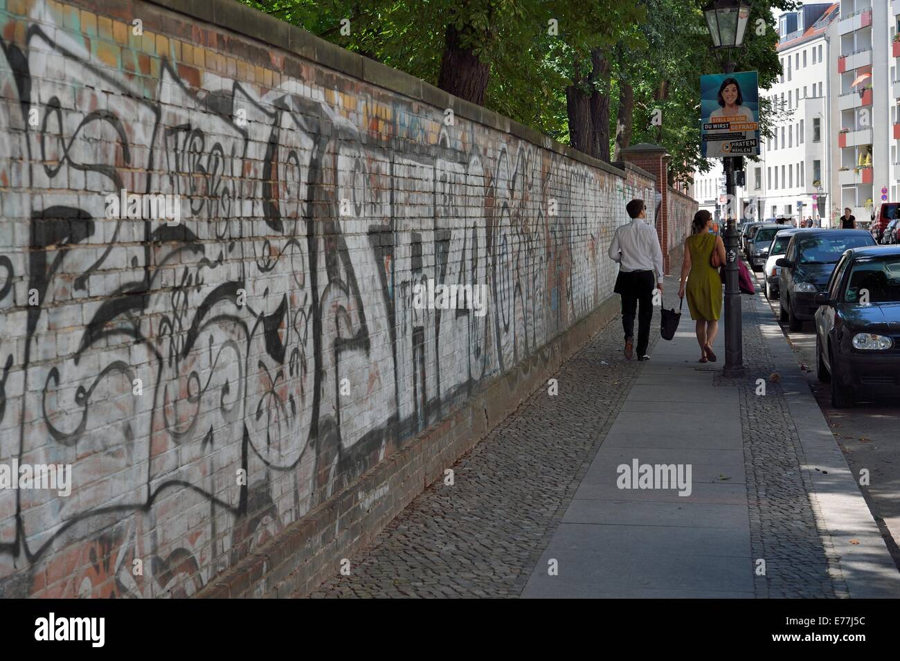 Graffiti on park wall Hackescher Market area Mitte Berlin Germany Stock Photo