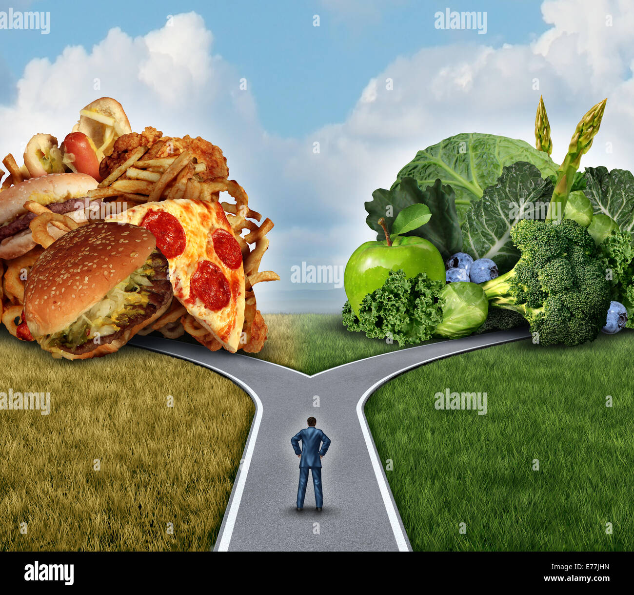Diet decision concept and nutrition choices dilemma between healthy good fresh fruit and vegetables or greasy cholesterol rich fast food with a man on a crossroad trying to decide what to eat for the best lifestyle choice. Stock Photo