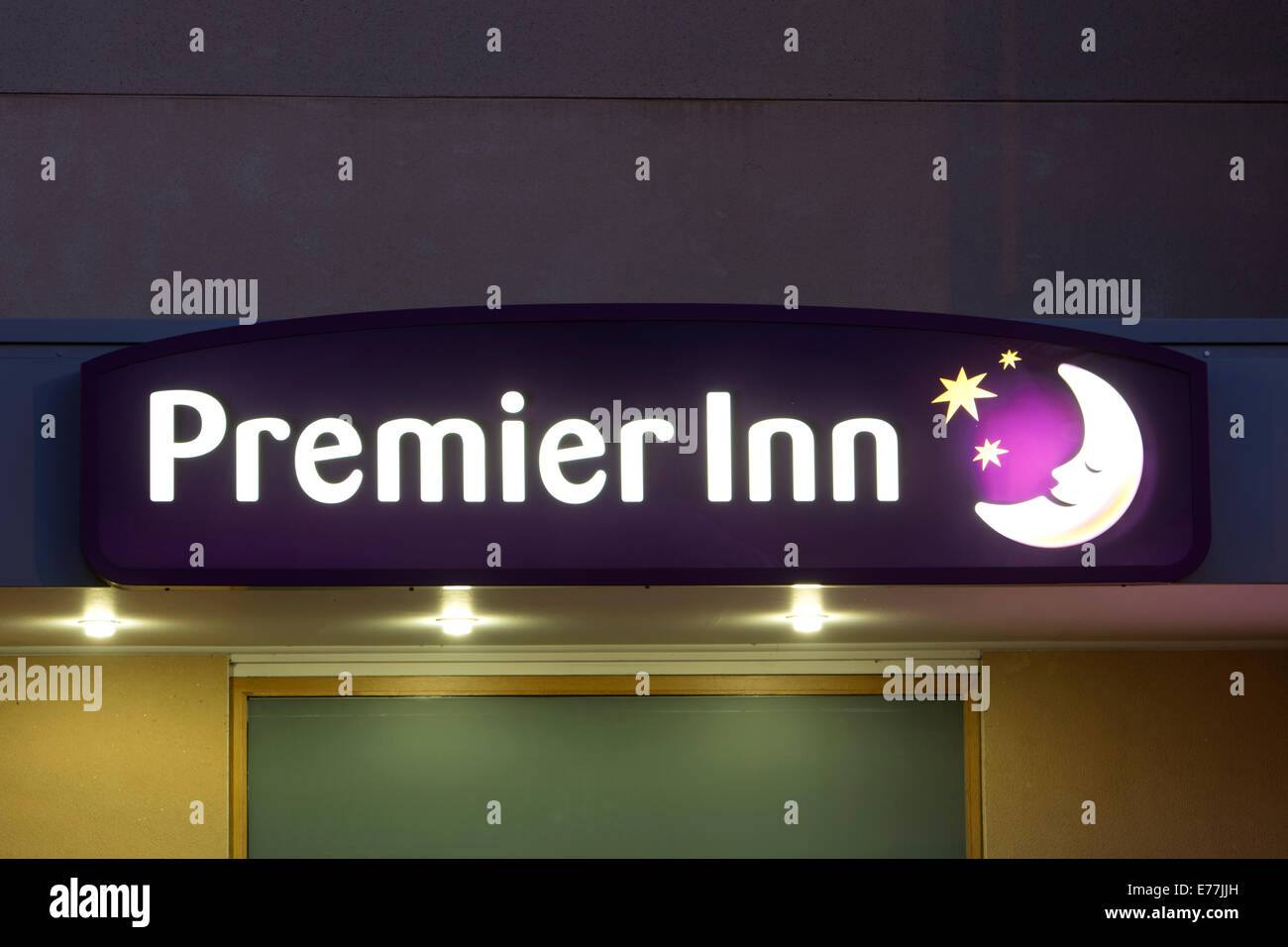 Premier Inn sign at night, Stratford-upon-Avon, UK Stock Photo