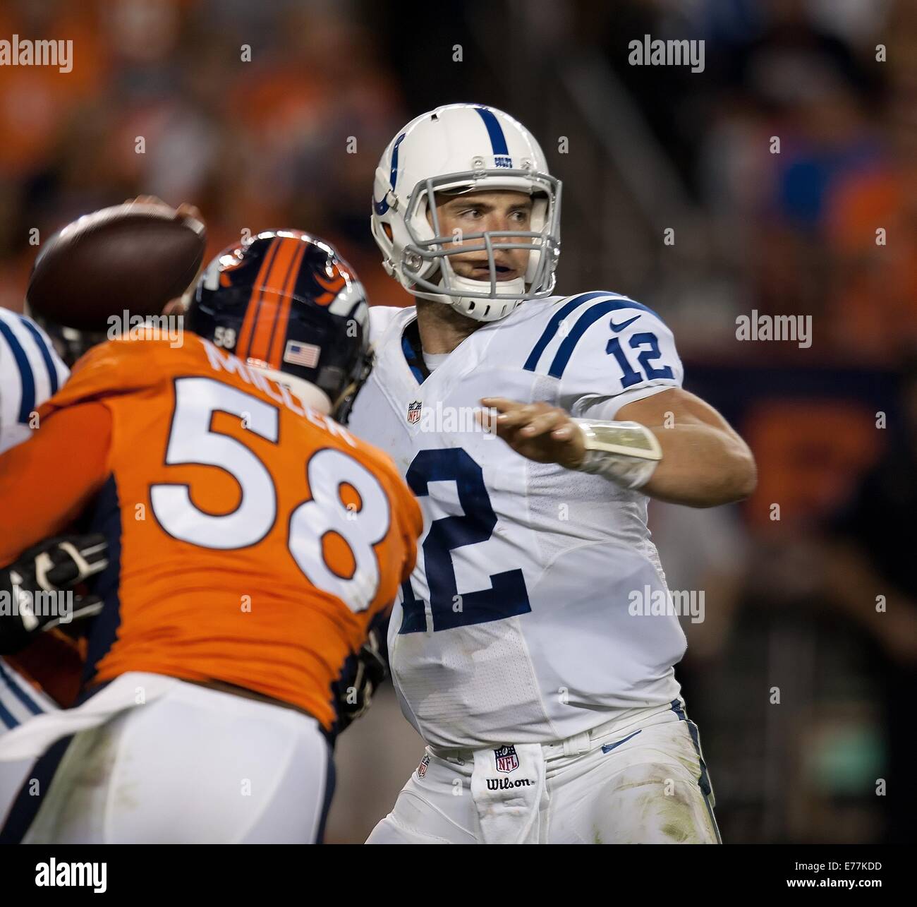 Denver, Colorado, USA. 7th Sep, 2014. Colts QB MATTHEW LUCK, center, concentrates on throwing a pass during the 4th. quarter at Sports Authority Field at Mile High Sunday night. The Broncos beat the Colts 31-24. © Hector Acevedo/ZUMA Wire/Alamy Live News Stock Photo