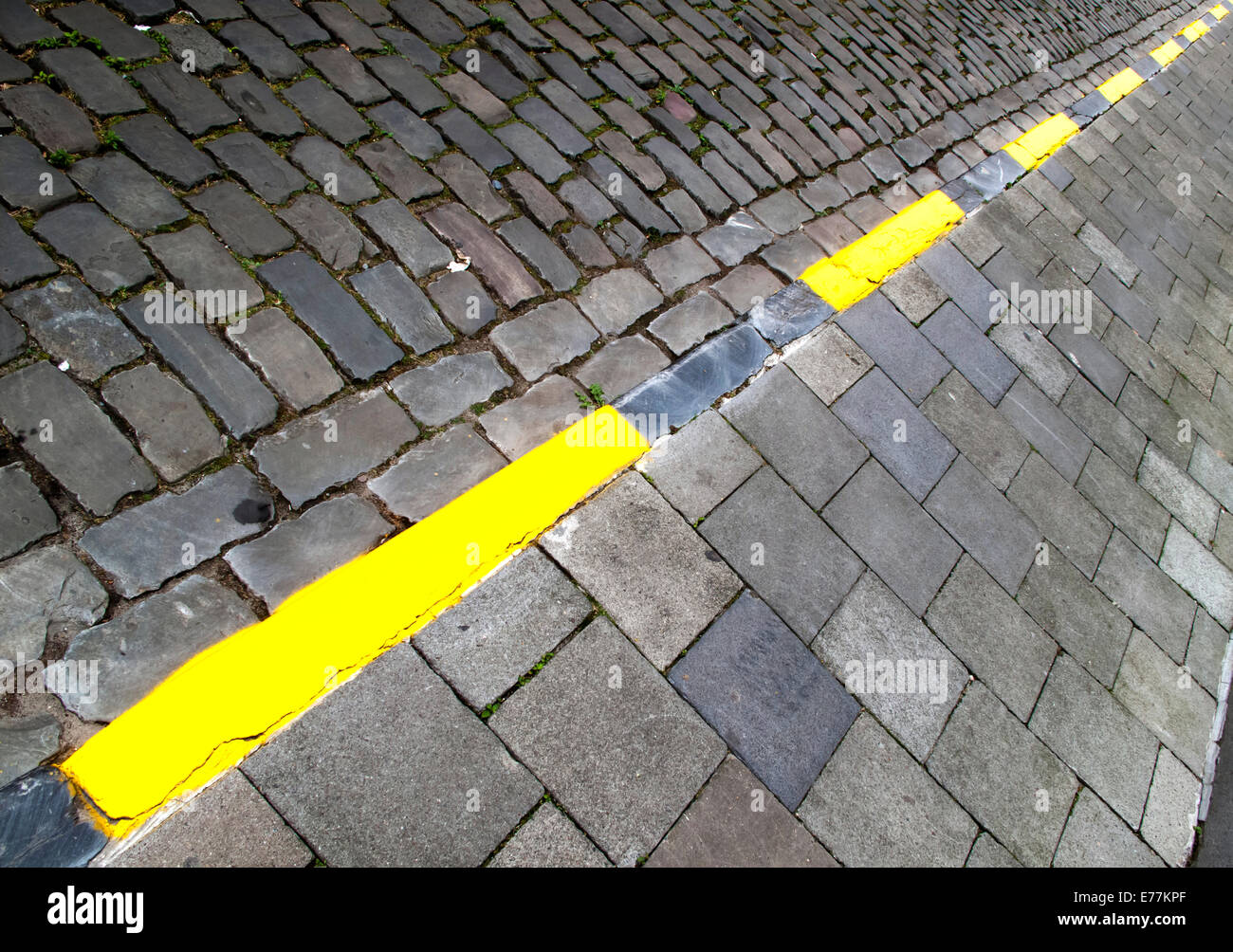 Yellow painted sidewalk Stock Photo Alamy