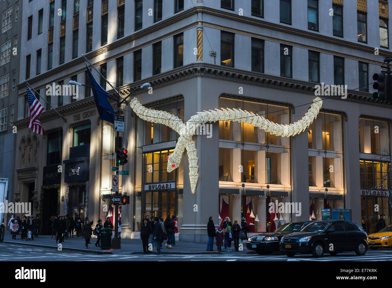 New York Bulgari illuminated serpent, seasonal Christmas decorations on the  exterior of their upscale boutique store on 5th Avenue, downtown New York  Stock Photo - Alamy