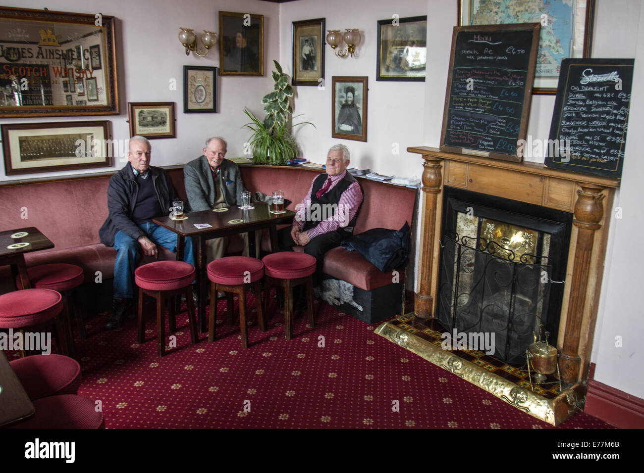 Drinkers in the interior of the Fat Cat Pub in Kelham Island in the Kelham Island Quarter of Sheffield South Yorkshire England Stock Photo