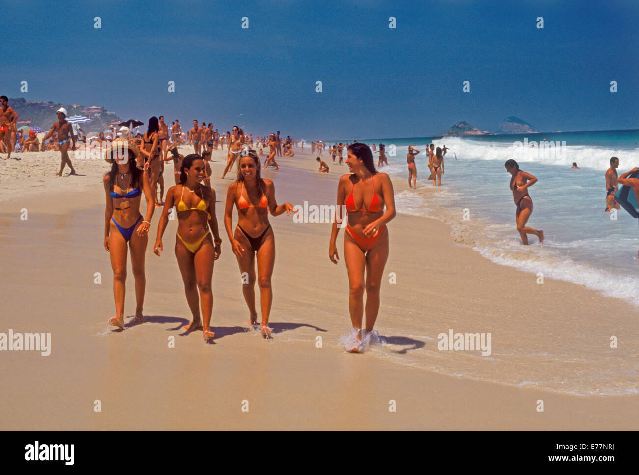 Four young women in bikinis walking along Ipanema Beach in Rio de Janerio  Stock Photo - Alamy