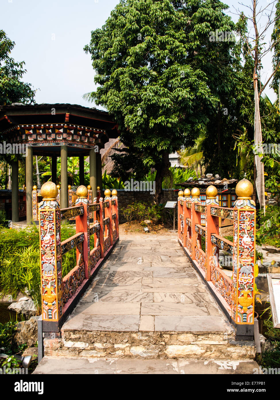 Bhutan traditional bridge and gazebo in garden Stock Photo - Alamy