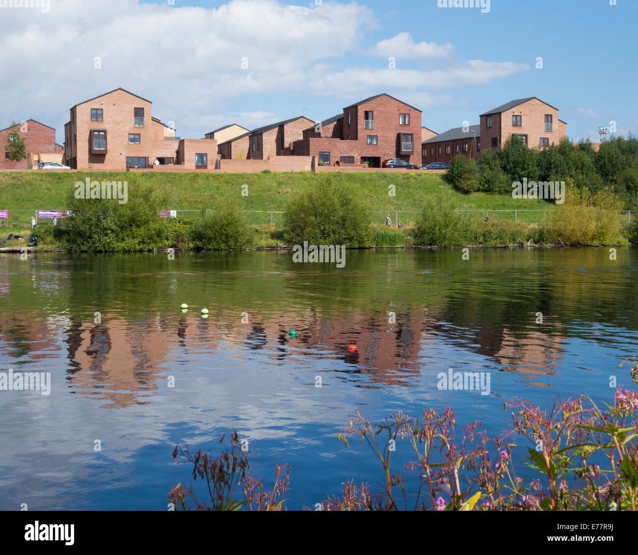 View across the river Tees to new housing development in front of