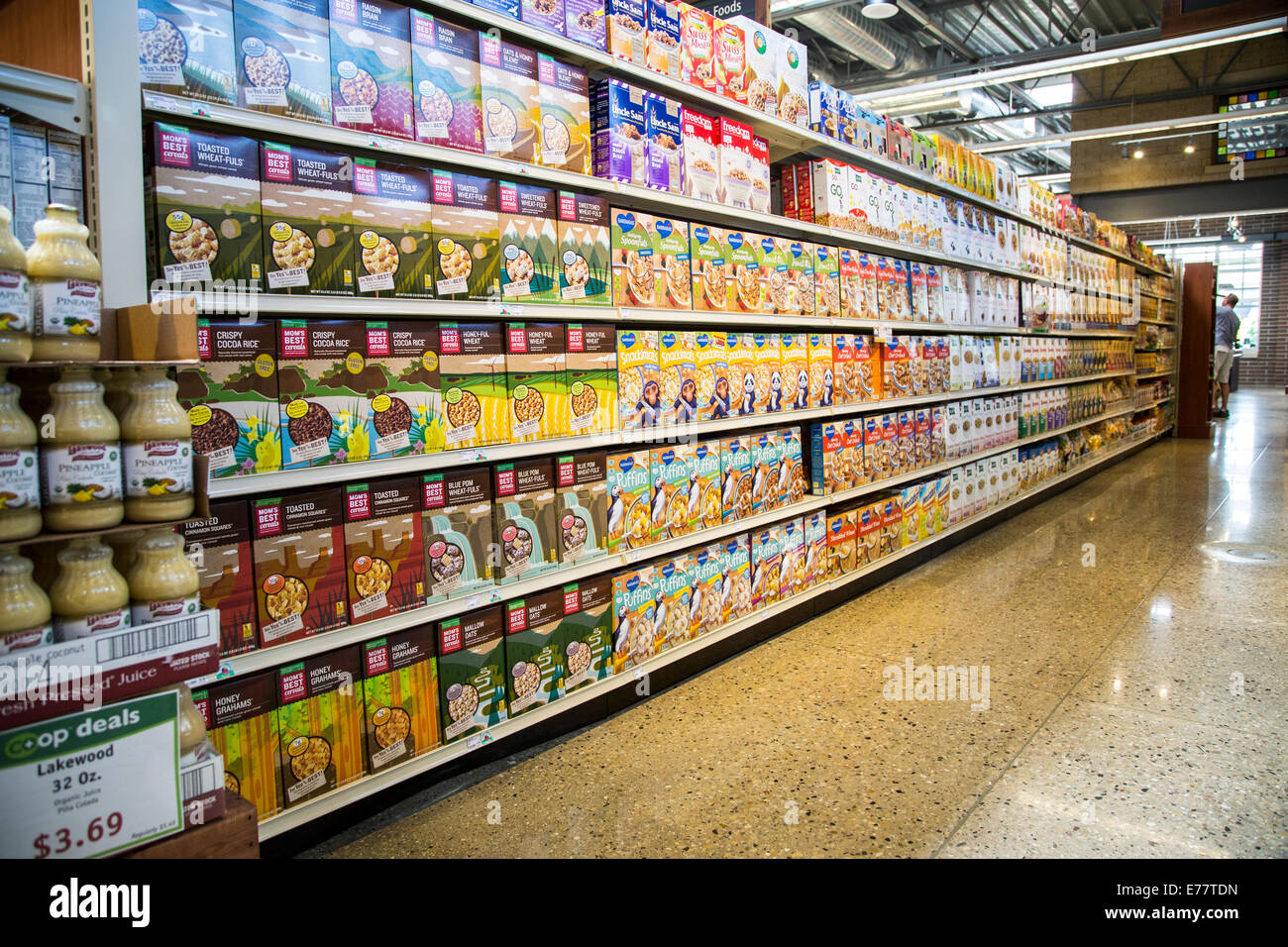 Organic breakfast cereal boxes on the shelves of a natural foods grocery store. Stock Photo