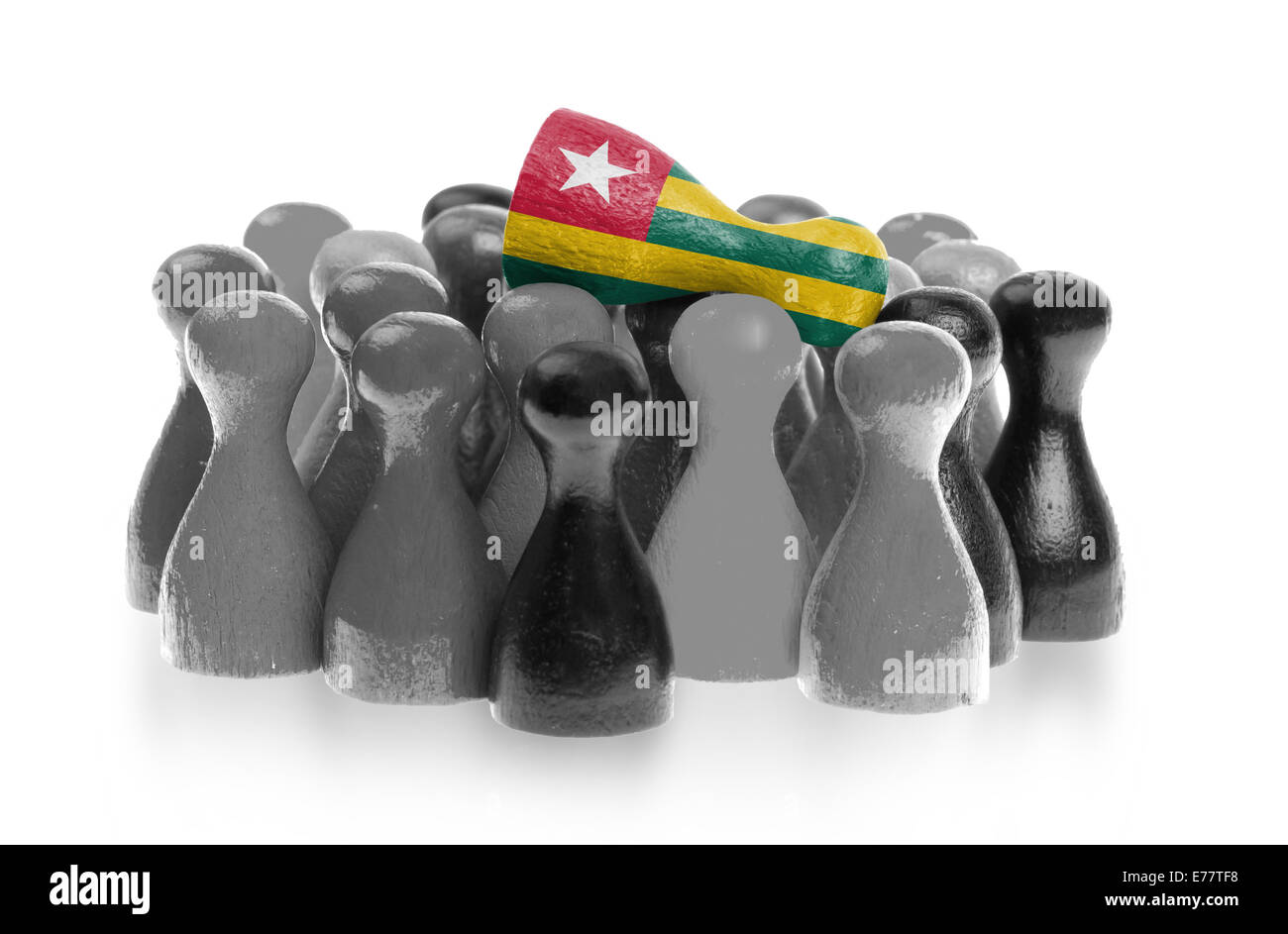 One unique pawn on top of common pawns, flag of Togo Stock Photo