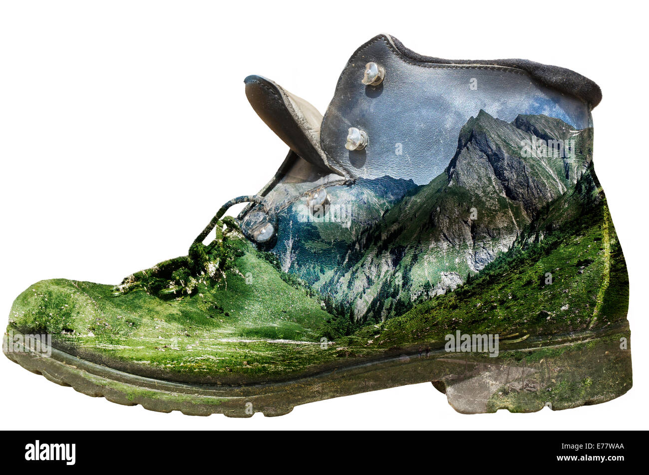 Isolated historic hiking boot with alp panorama overlay Stock Photo