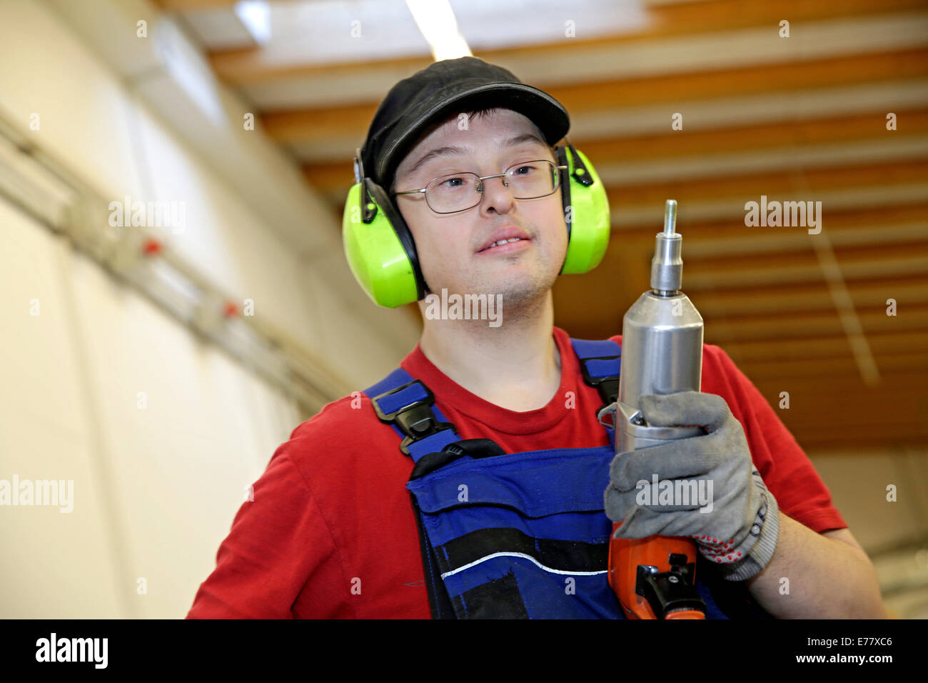 Man with Down syndrome at work Stock Photo Alamy