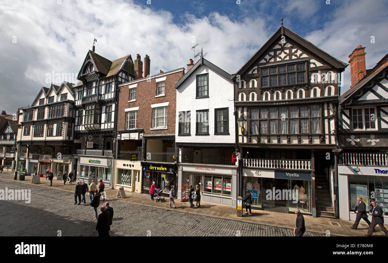 Iconic black & white 14th century heritage listed buildings beside more modern structures in historic English city of Chester Stock Photo