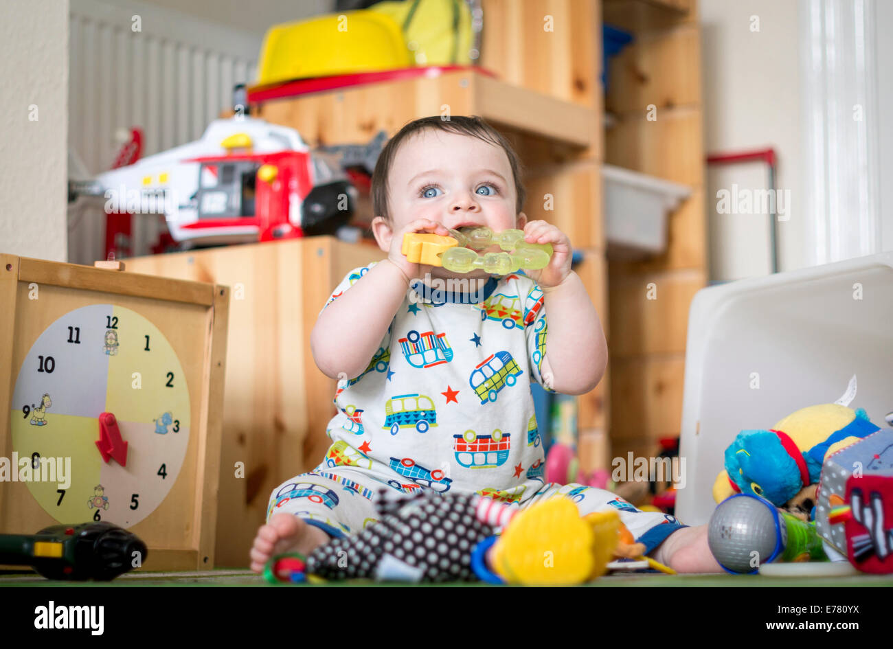 Baby playing with his toys Stock Photo