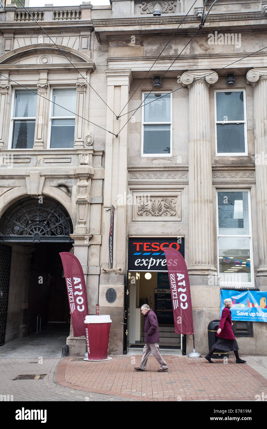 Tesco Express Local small Supermarket and Costa Coffee on Church Street in Sheffield South Yorkshire UK Stock Photo