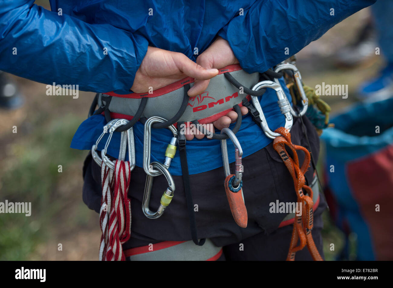 Carabiners on the belt of a mountain climber. Stock Photo