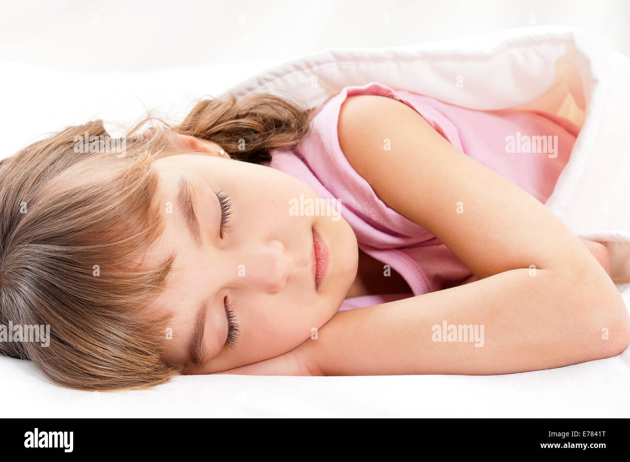 Girl on bed Stock Photo