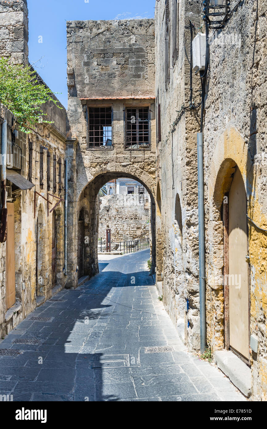 Arched narrow street in Rhodes old town Stock Photo