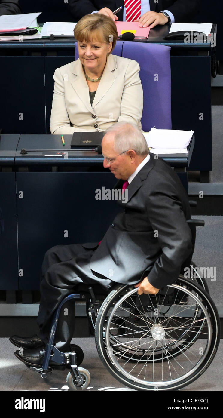Berlin, Germany. 9th Sep, 2014. German Finance Minister Wolfgang Schaeuble (Front) and German Chancellor Angela Merkel attend a debate on the 2015 federal budget at the Bundestag, the lower house of parliament, in Berlin, Germany, on Sept. 9, 2014. Credit:  Zhang Fan/Xinhua/Alamy Live News Stock Photo