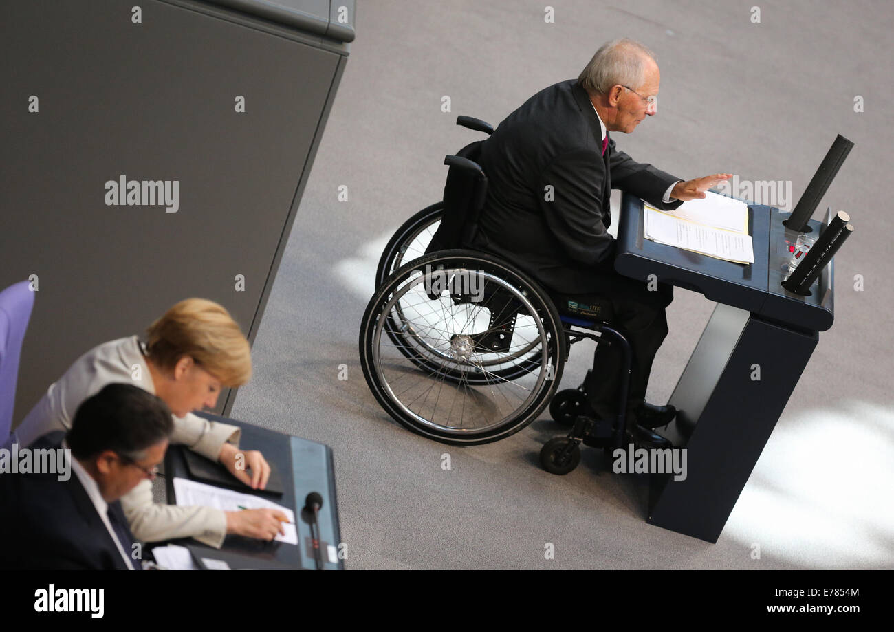 Berlin, Germany. 9th Sep, 2014. German Finance Minister Wolfgang Schaeuble (R) speaks during a debate on the 2015 federal budget at the Bundestag, the lower house of parliament, in Berlin, Germany, on Sept. 9, 2014. Credit:  Zhang Fan/Xinhua/Alamy Live News Stock Photo