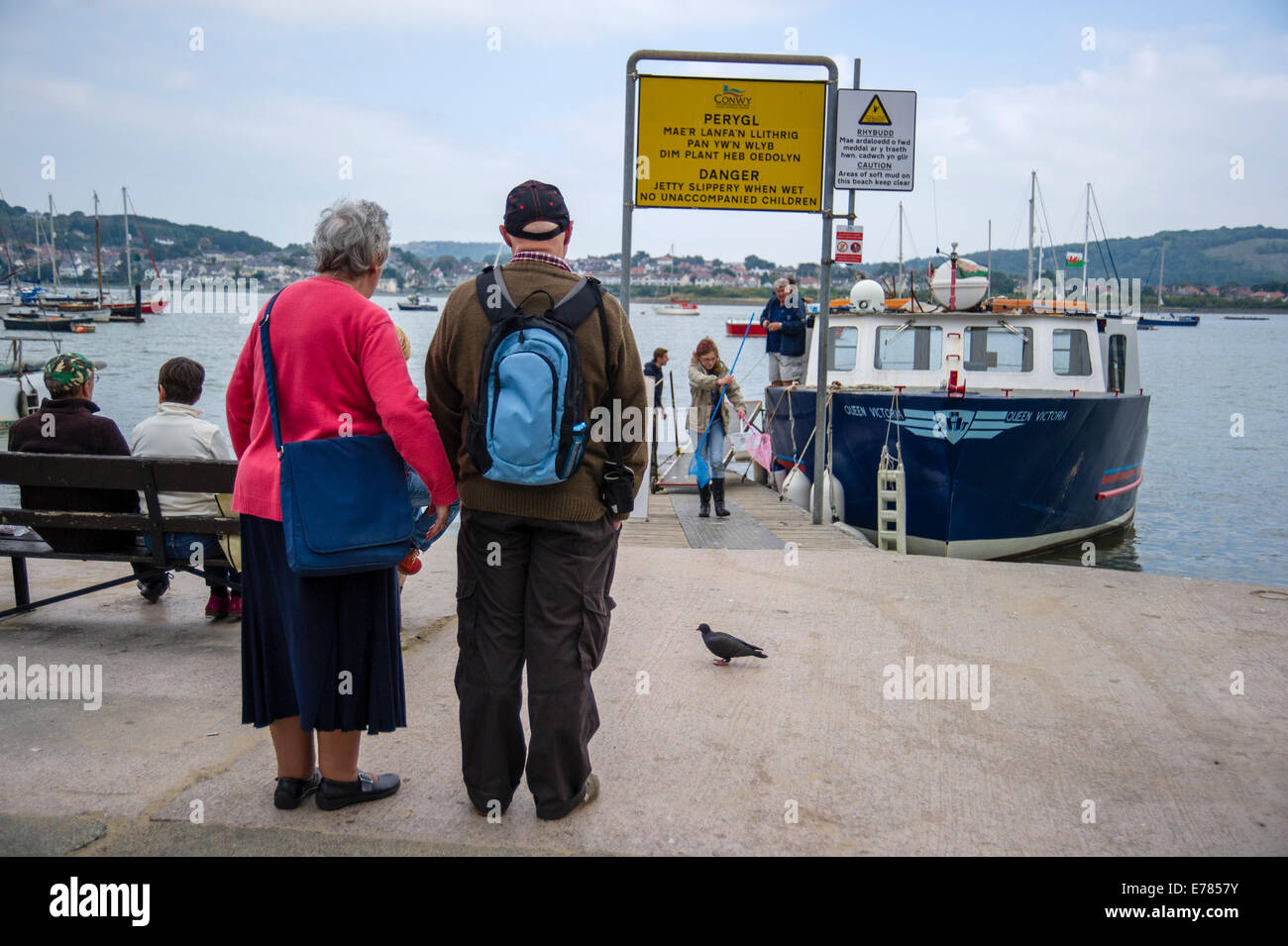 Ppeople waiting for a boat trip in Conwy, North Wales. Stock Photo