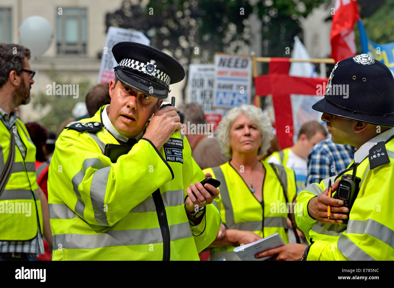 London, England, UK. Metropolitan Police officers at the People's march for the NHS, London, 2014 Stock Photo