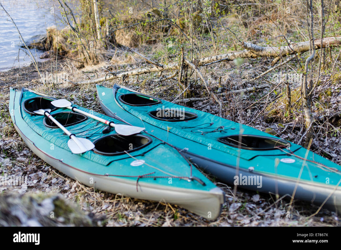 Two green kayaks Stock Photo