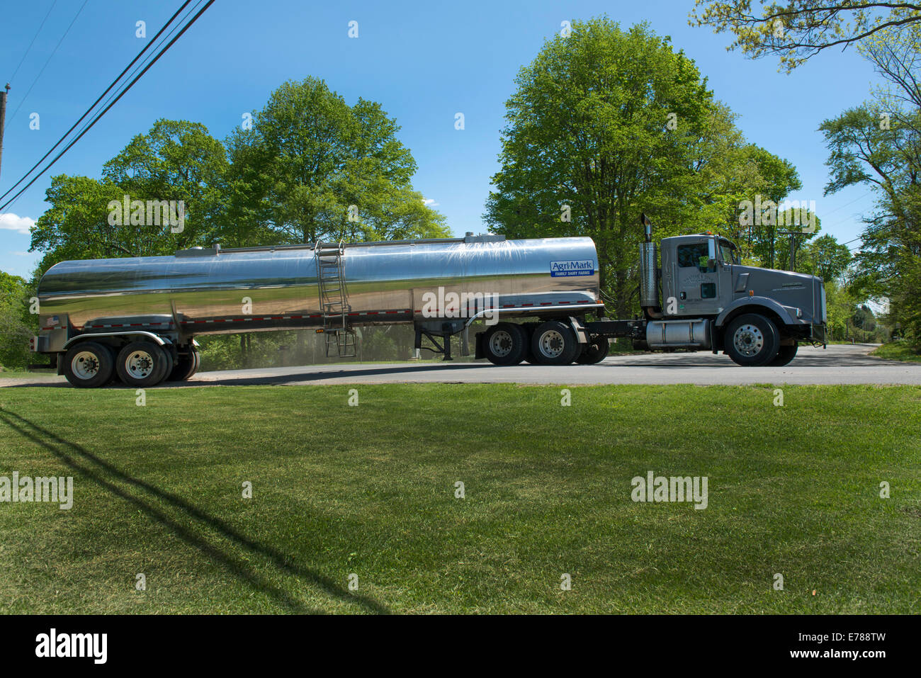 Tank or tanker truck visits dairy farm collecting mik for Agri-Mark cooperative.  Woodbury, CT. Stock Photo