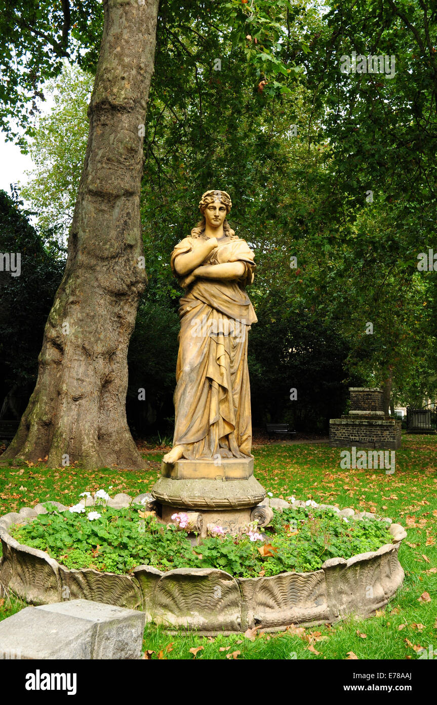 Statue of Euterpe. Terracotta figure of the Muse of instrumental music, St George's Gardens, Bloomsbury, Camden, London, England Stock Photo