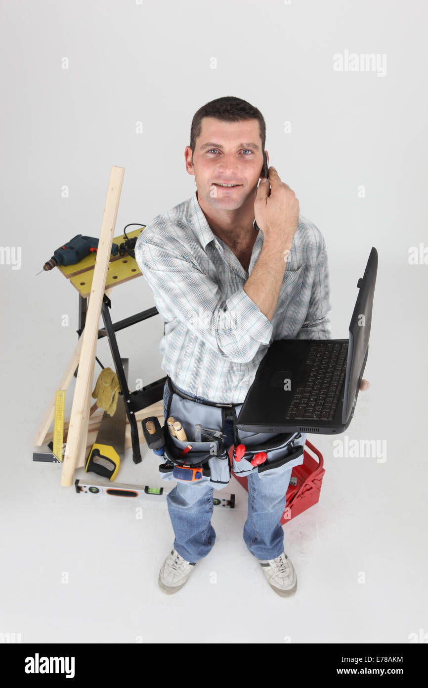 Craftsman laptop mobile phone hi-res stock photography and images - Alamy