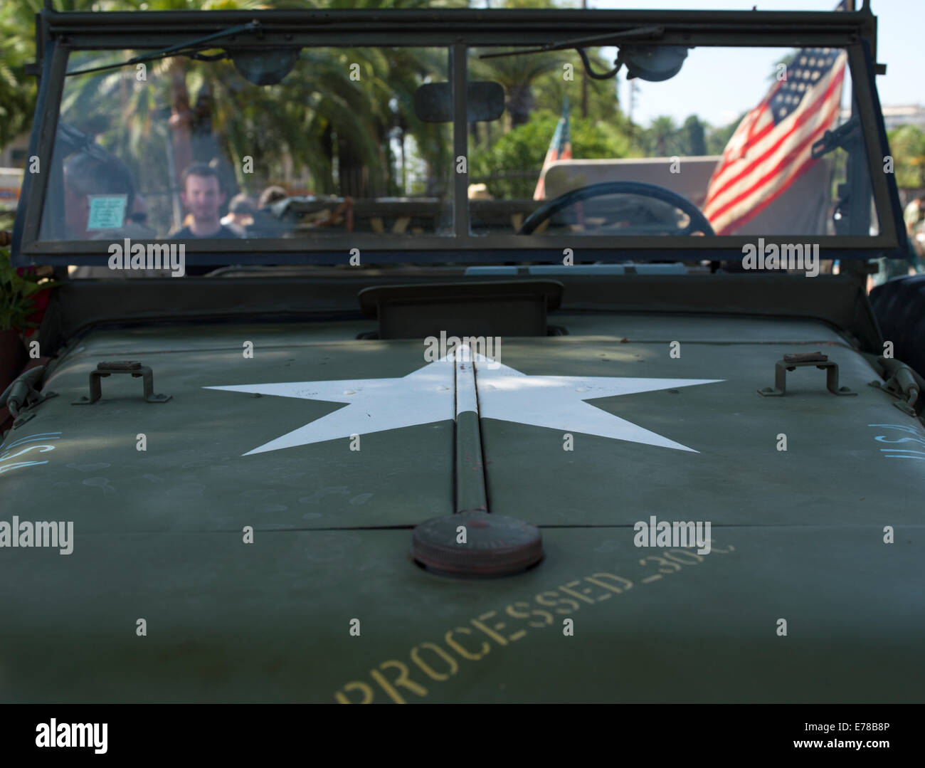 Hood of a vintage American jeep from World War II flying