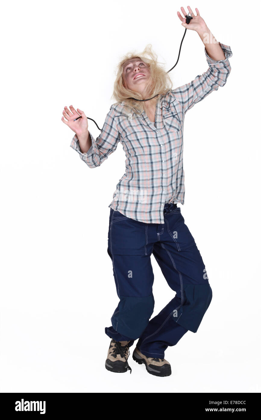 Woman strangled by an electric cable Stock Photo