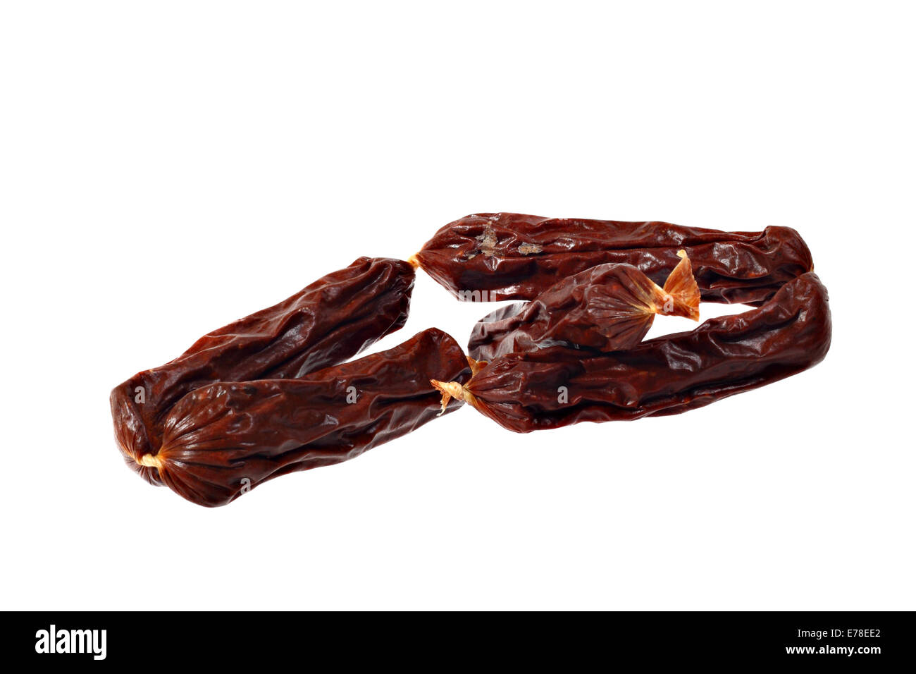 Dried sausages for dogs isolated on white background Stock Photo - Alamy