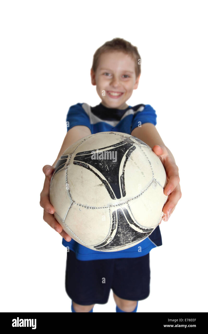 Football in boy hands with selective focus on ball. Portrait on white