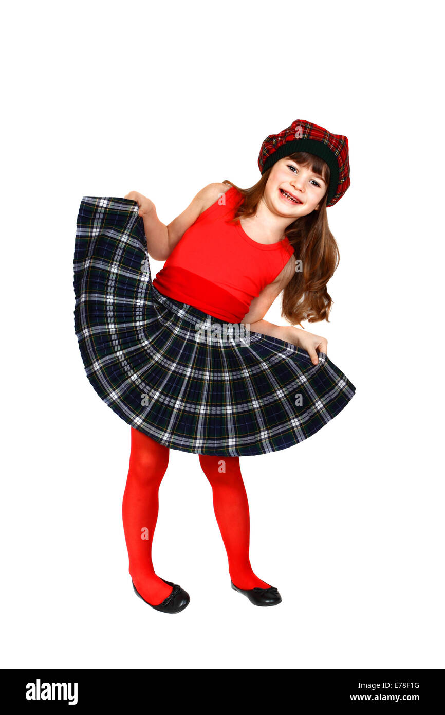 Cute little girl dressed in Scottish style. Portrait isolated on white background Stock Photo